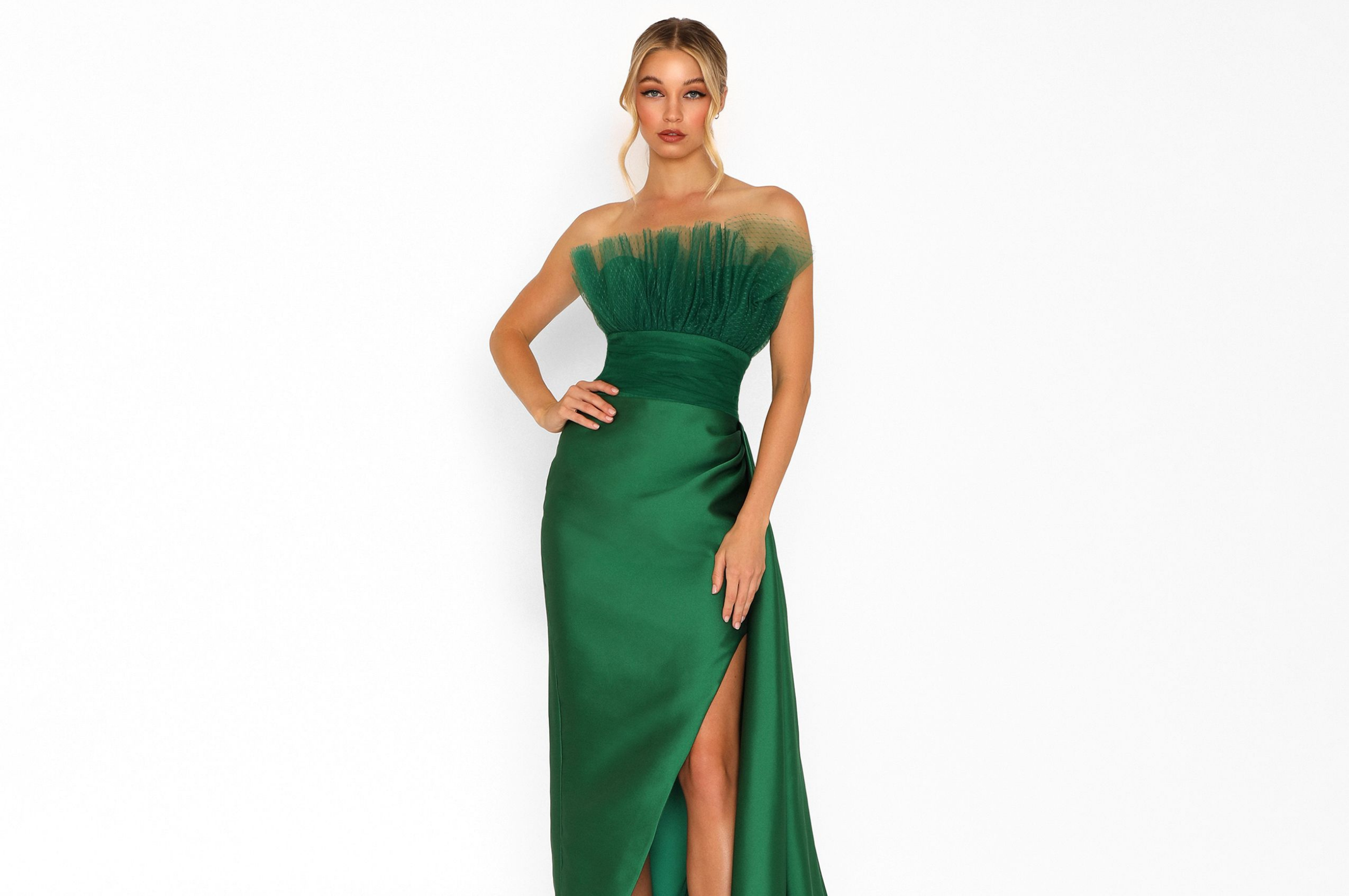 Model wearing a long green dress