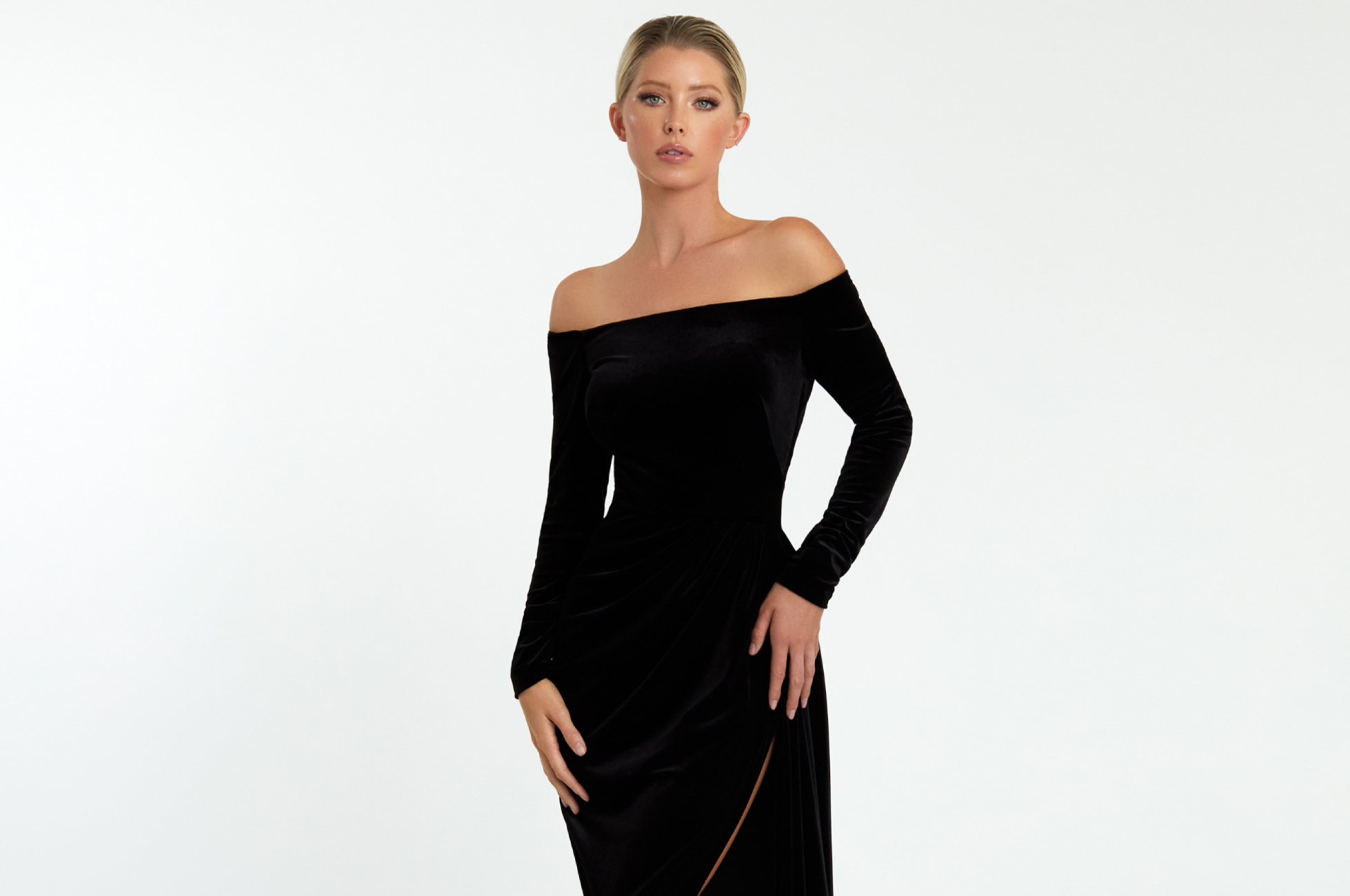 Model wearing a black evening gown