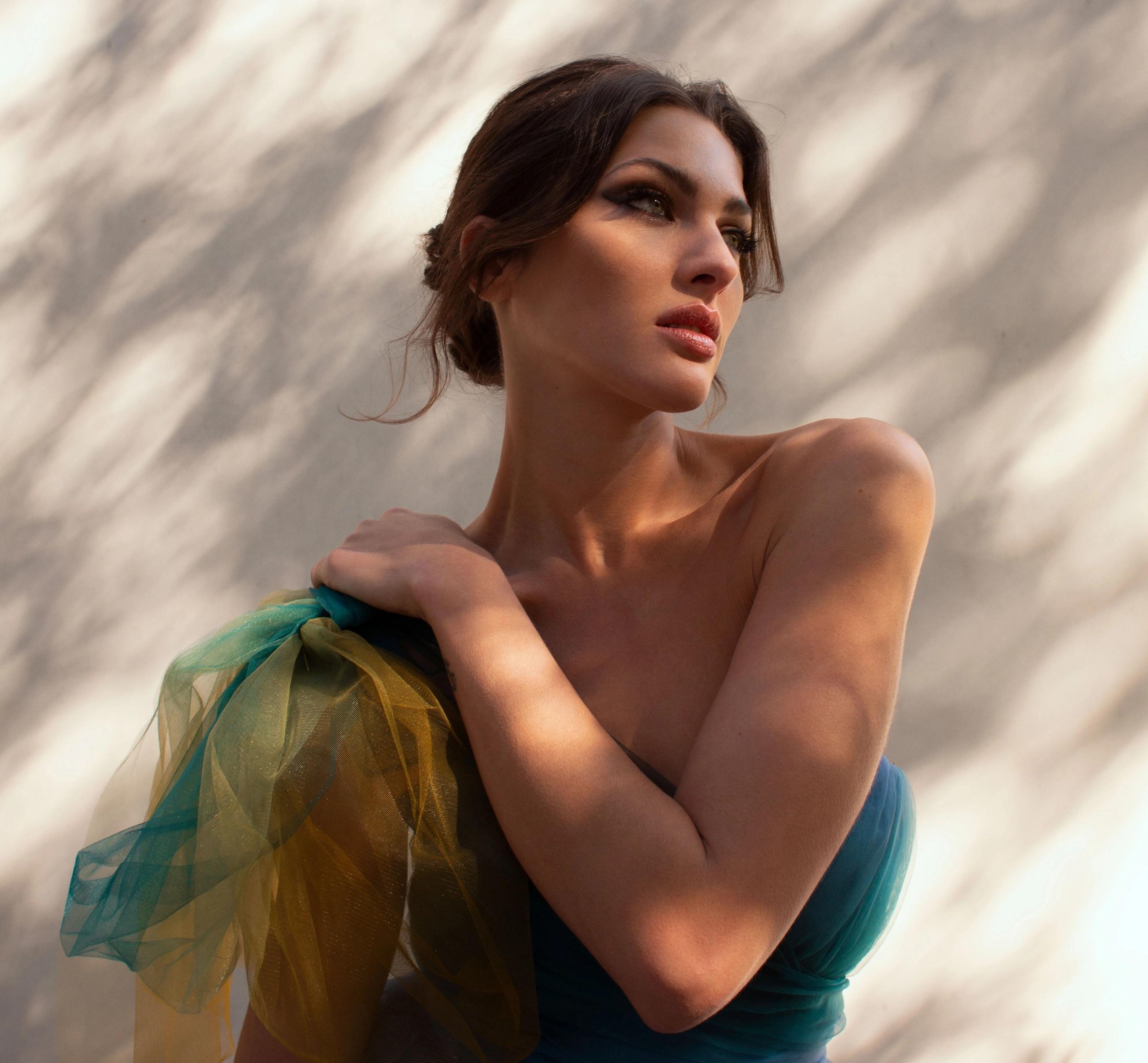 Model wearing a dold gown. Mobile image