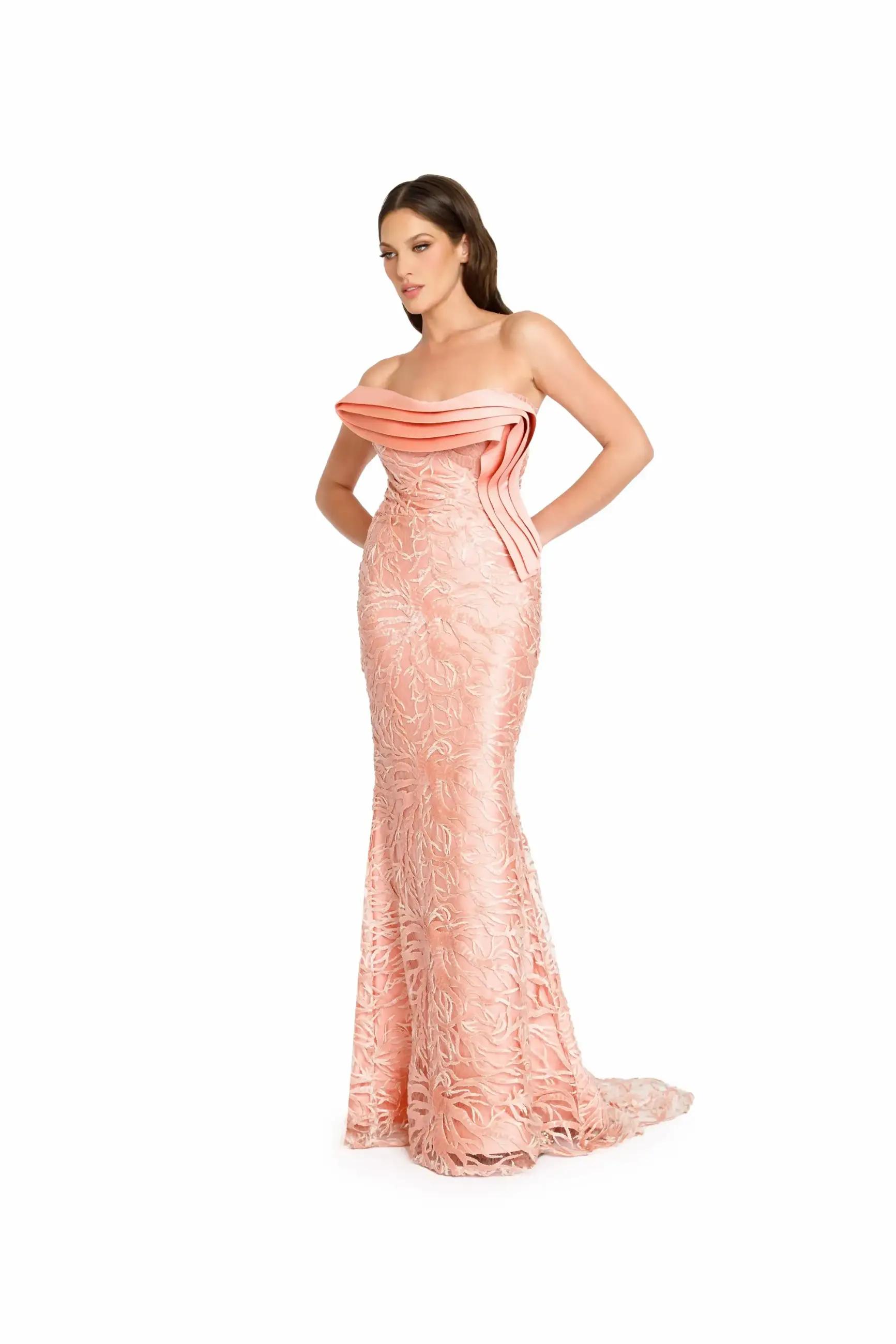 Model wearing a pink evening gown