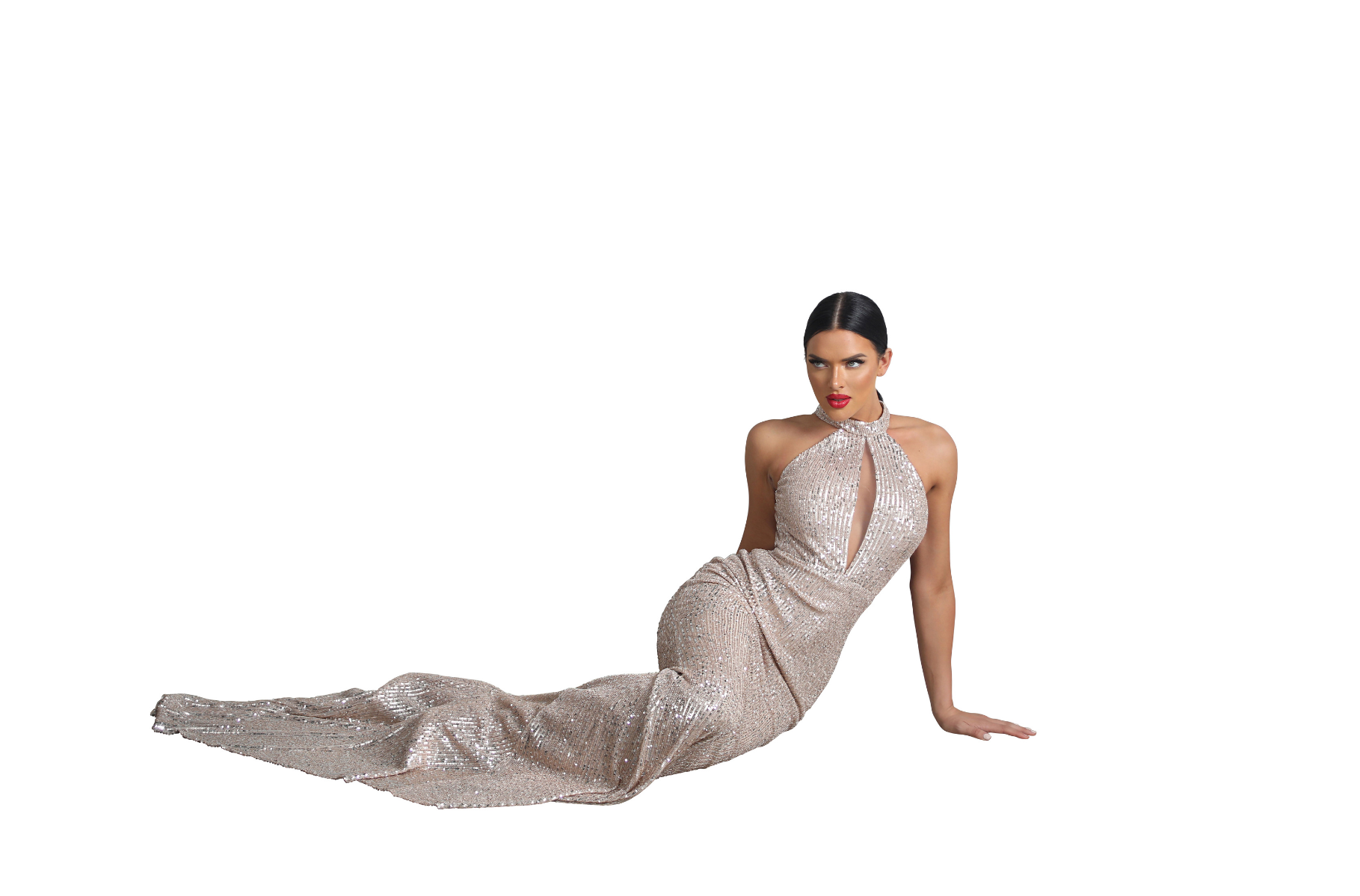 Model wearing an evening dress sitting on the floor