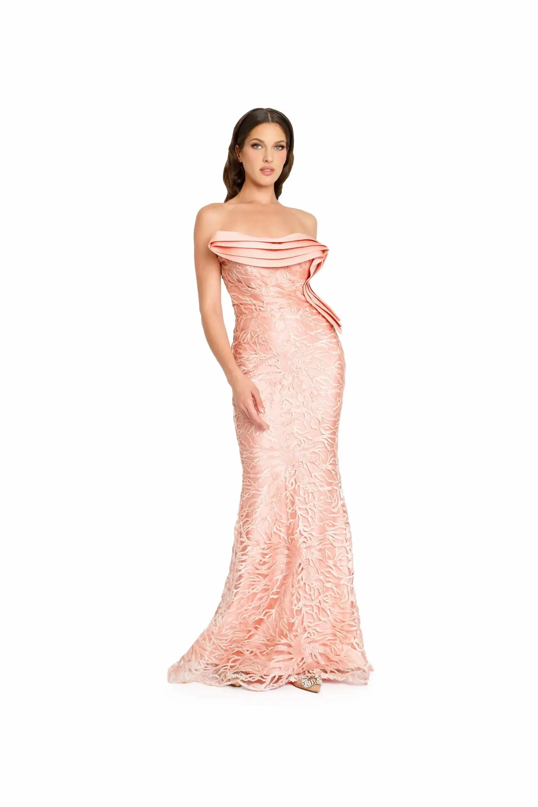 Model wearing a pink evening gown