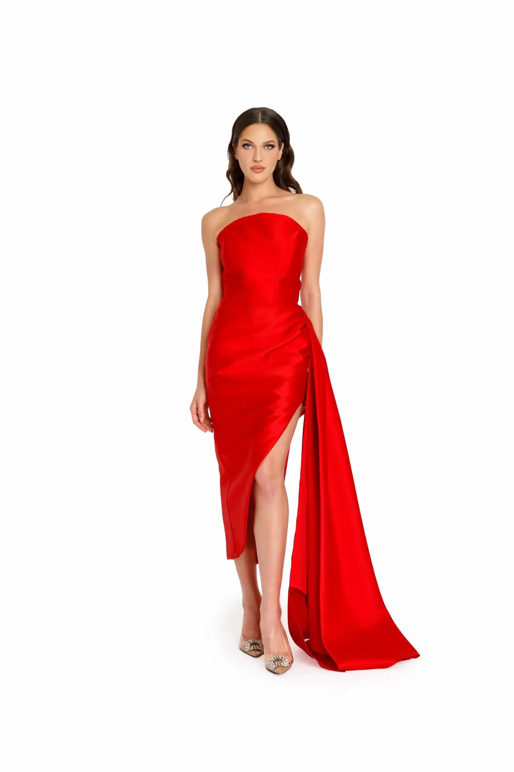 Model wearing a long red evening gown