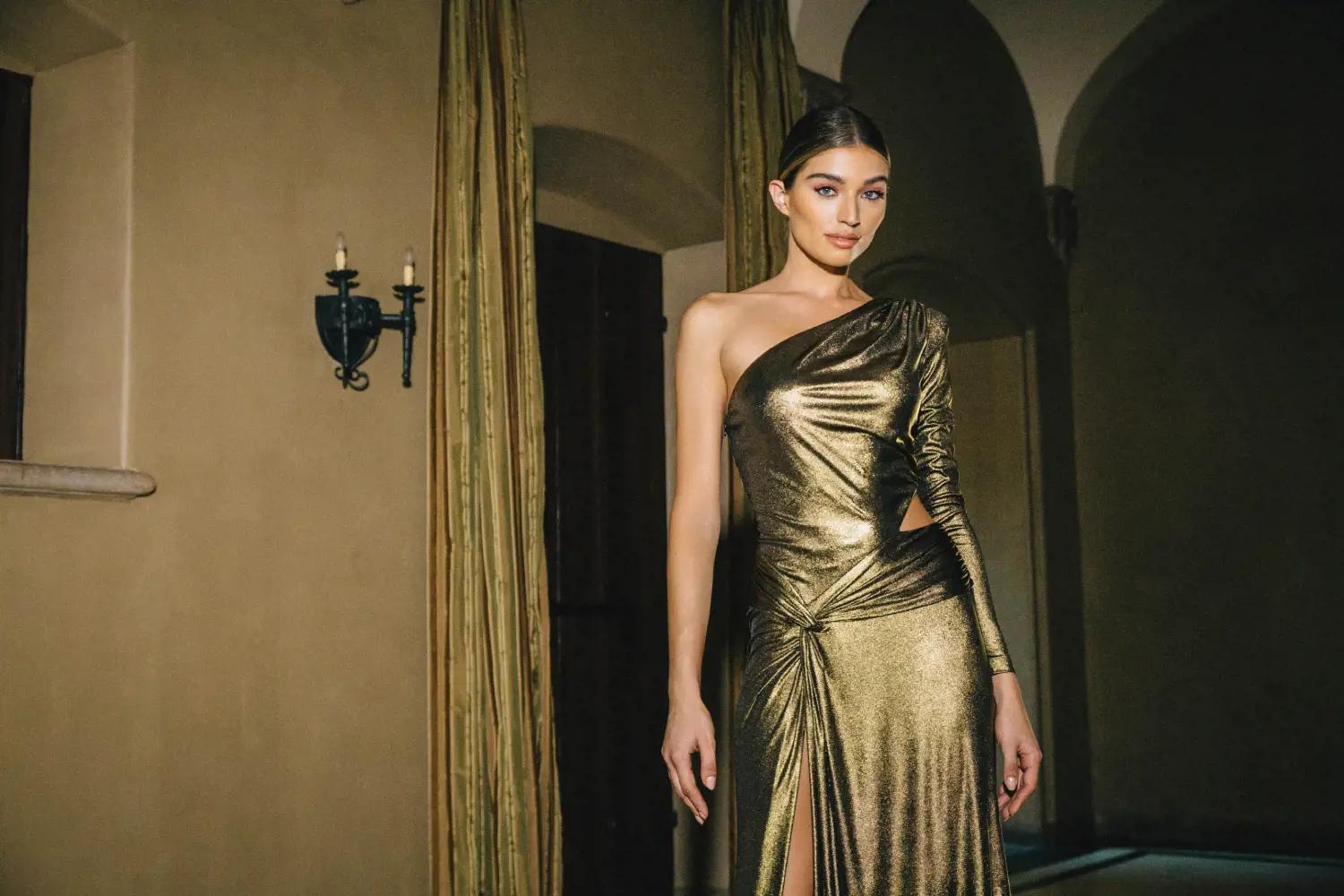 Model wearing a bronze evening gown