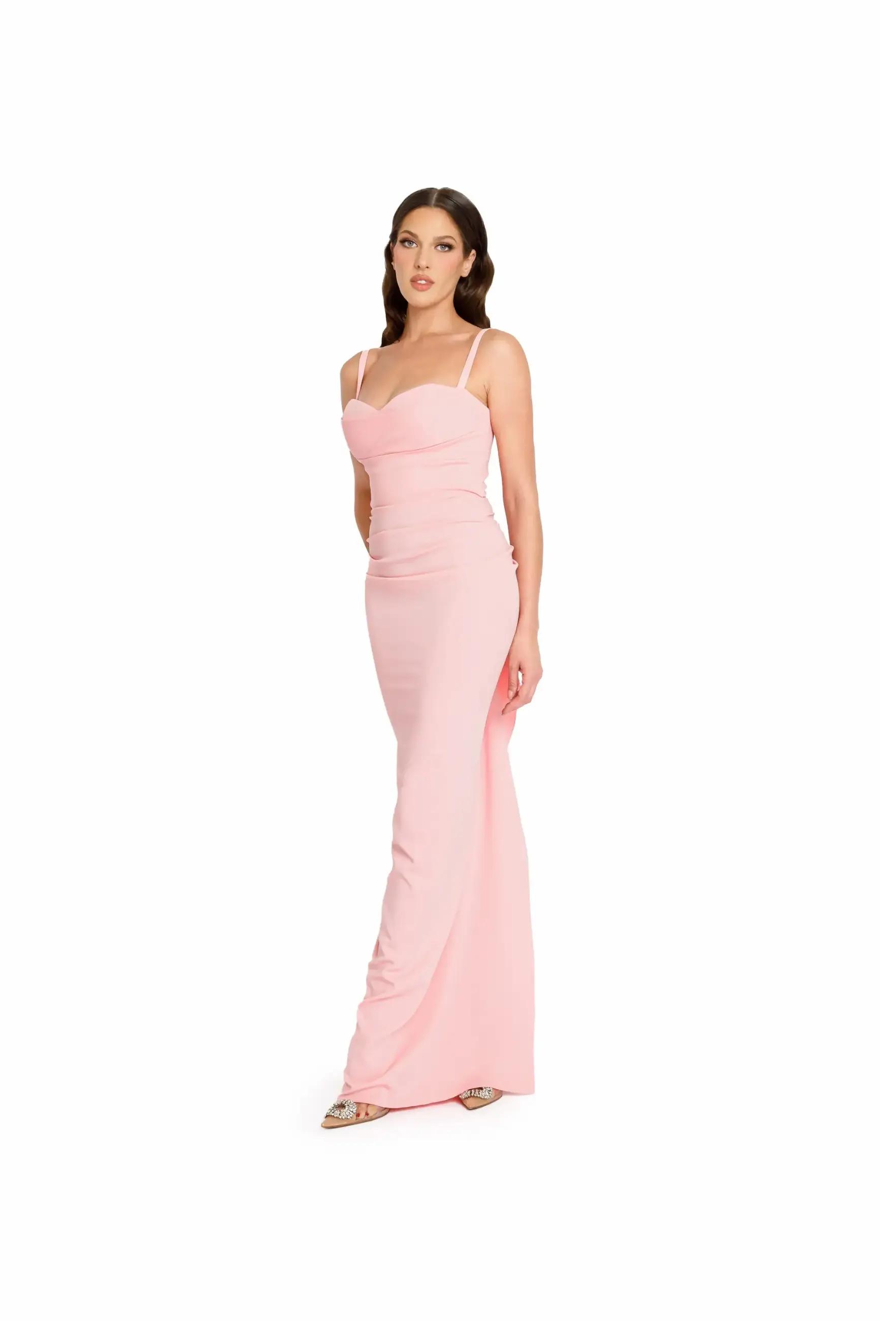 Model wearing a long pink evening gown
