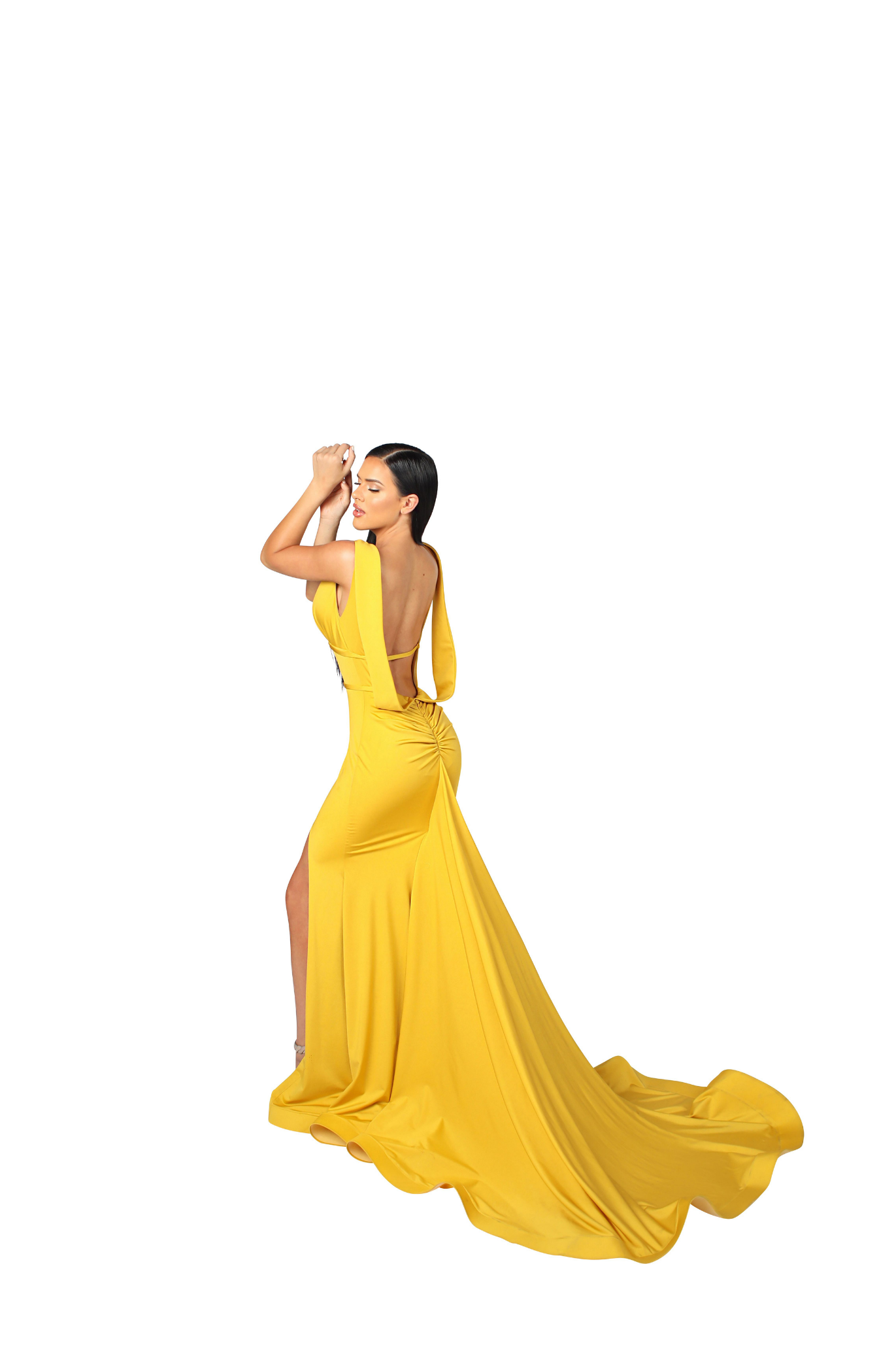 Model wearing a bright yellow evening dress