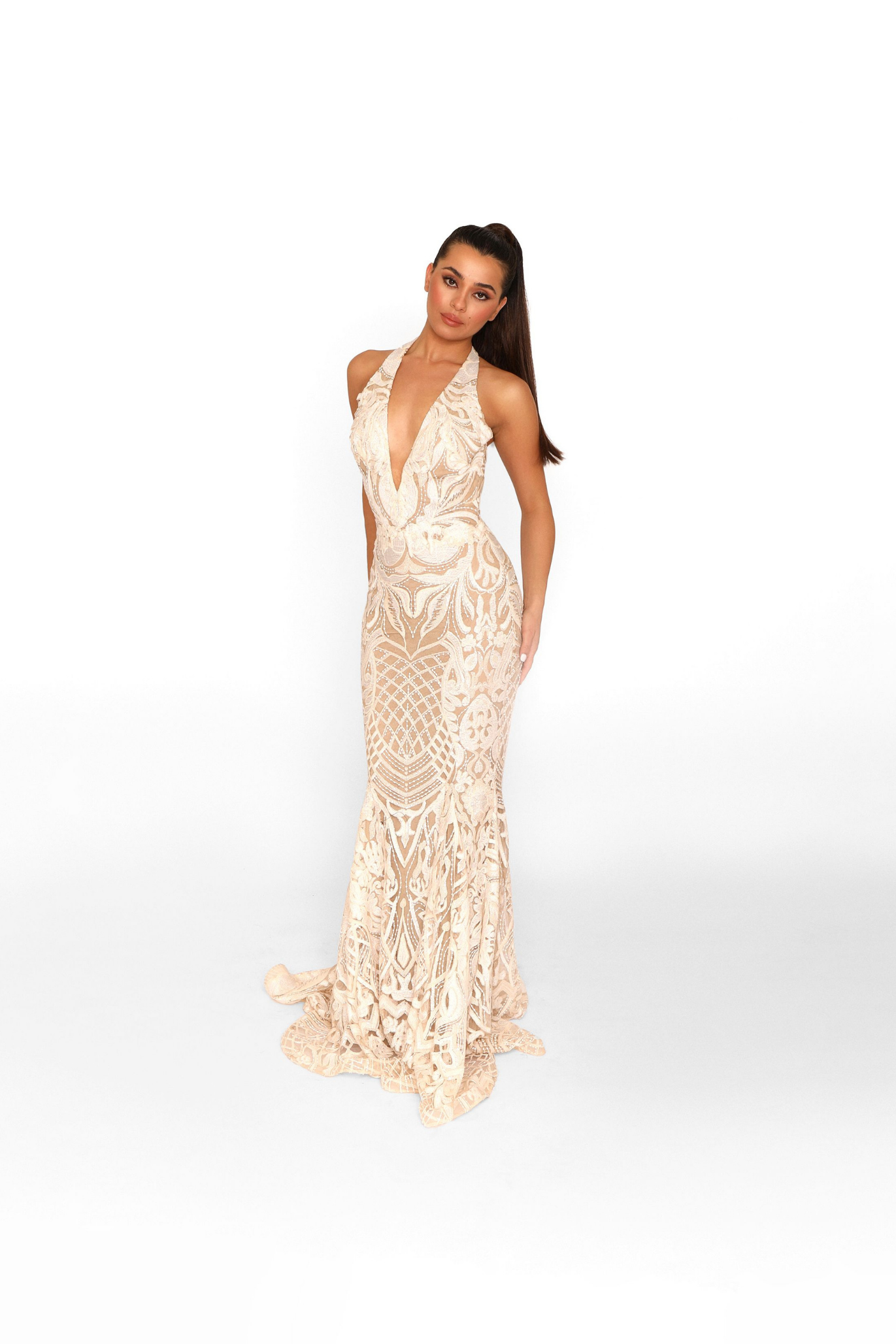Model wearing a long white evening gown